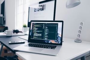 photo of a computer and monitor sitting on a desk